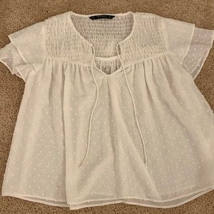 White cap sleeve blouse